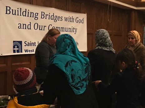 Thanksgiving dinner for refugees at St. John’s Episcopal Church, West Hartford. Photo courtesy of Rector Susan Pinkerton